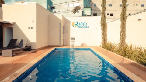 Piscina e área de lazer - Pousada Recanto das Caldas