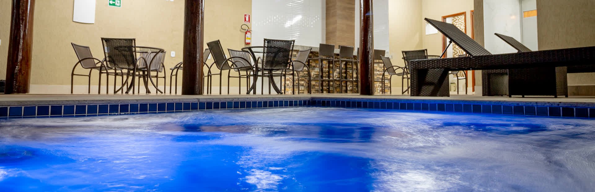 Piscina e área de lazer - Pousada Recanto das Caldas